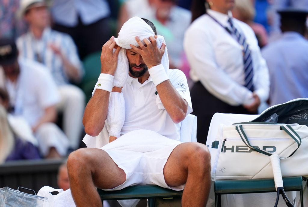 Novak Djokovic in-between games during his Gentlemen's Singles semi-final match against Jannik Sinner 