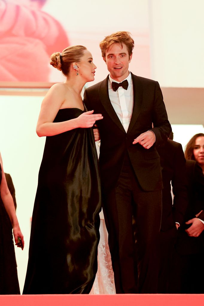 Jennifer Lawrence and Robert Pattinson depart the "Die My Love" red carpet at the 78th annual Cannes Film Festival 