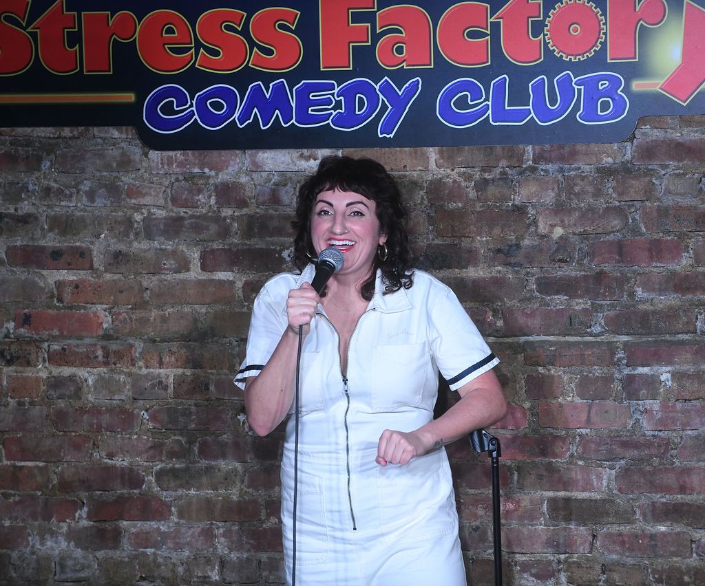 Steph Tolev performs at The Stress Factory Comedy Club on March 7, 2024 in New Brunswick, New Jersey