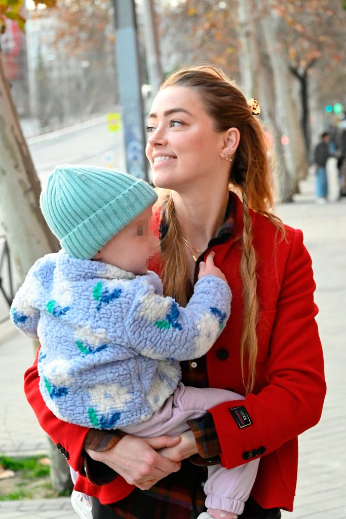 Amber Heard and her daughter Oonagh Paige seen out and about in Madrid
