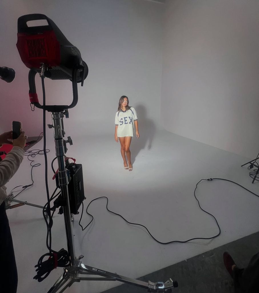 Photo shared by Lola Consuelos from a photoshoot in Los Angeles in which she appears wearing a oversized jersey with "SEX" written on it