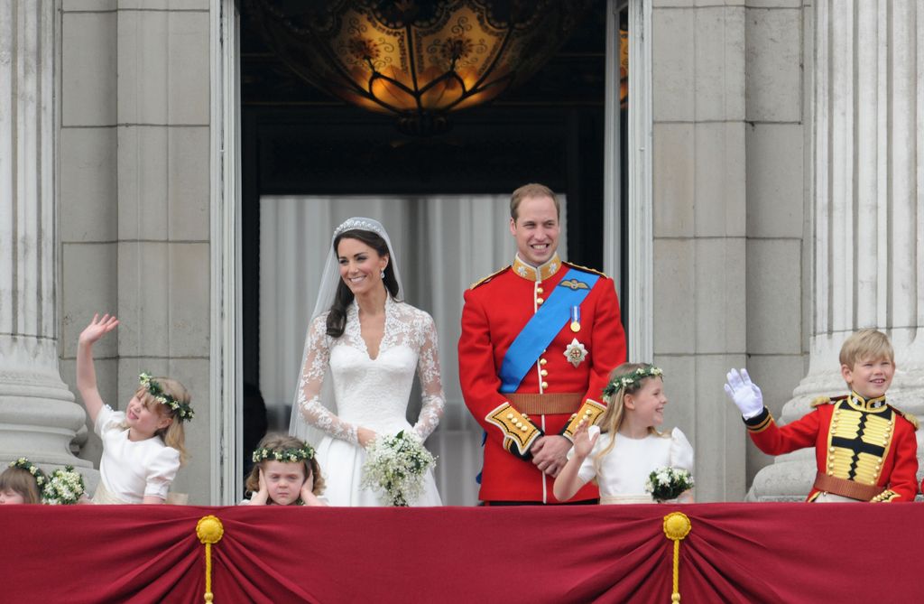 The Prince and Princess of Wales with their bridesmaids on the Buckingham Palace balcony