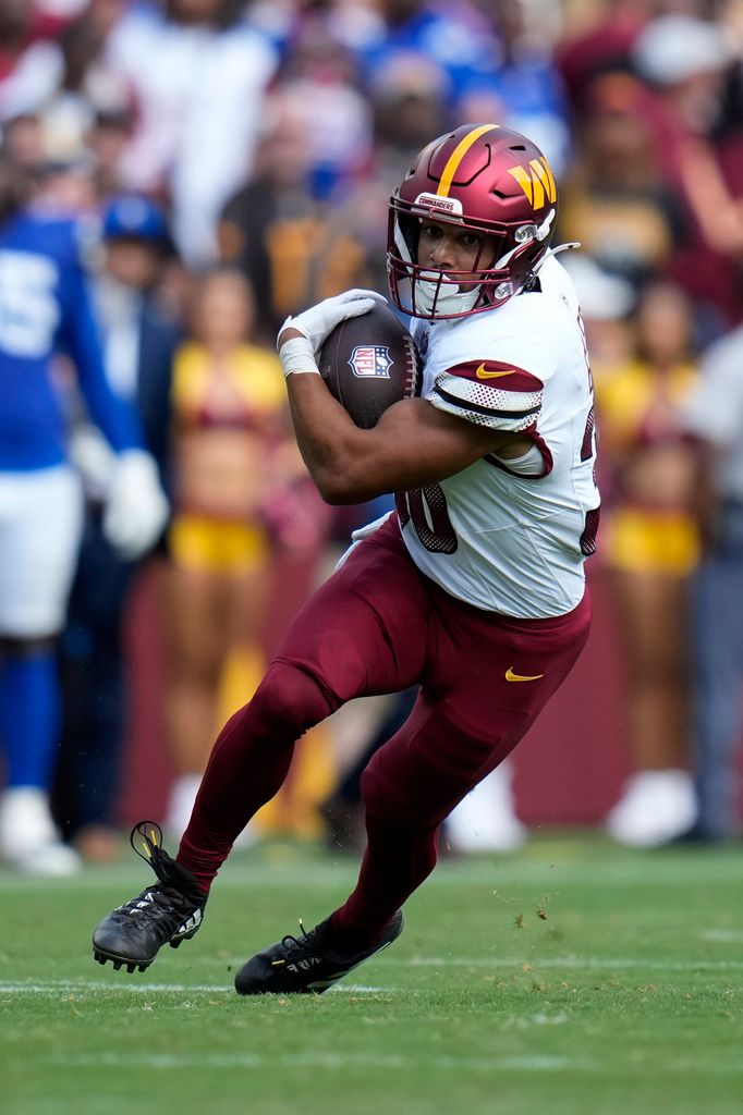 Austin Ekeler #30 of the Washington Commanders