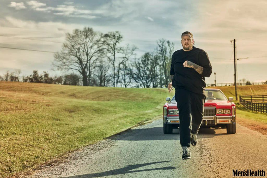Jelly Roll runs in a photoshoot for Men’s Health