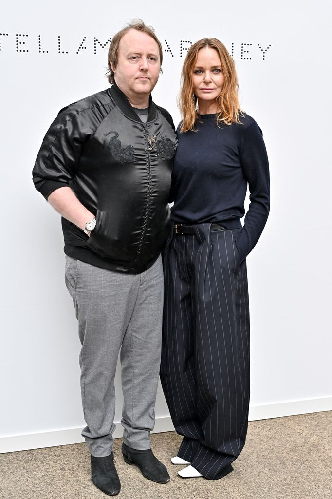 Stella McCartney standing with brother James McCartney 