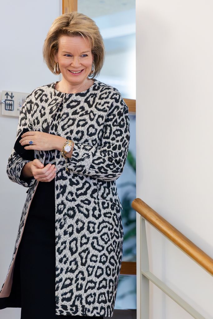 Mathilde smiling in leopard print jacket