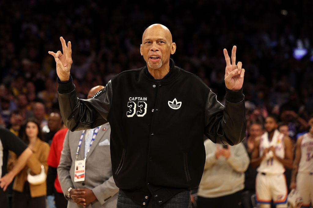 Kareem Abdul-Jabbar reacts on the court after LeBron James #6 of the Los Angeles Lakers passed Abdul-Jabbar to become the NBA's all-time leading scorer,