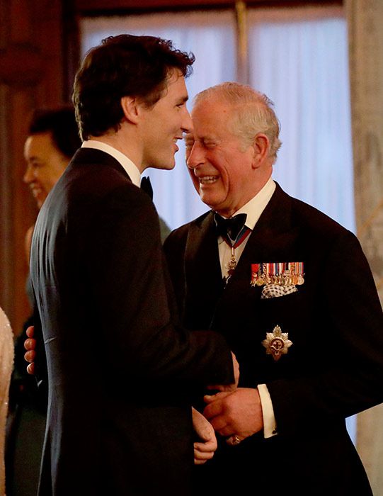 Justin Trudeau laughing with Prince charles