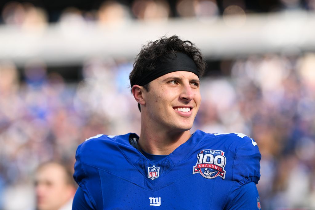 Tommy DeVito #15 of the New York Giants smiles on the field prior to the start of the game against the Tampa Bay Buccaneers at MetLife Stadium on November 24, 2024 in East Rutherford, New Jersey. (Photo by Kathryn Riley/Getty Images)