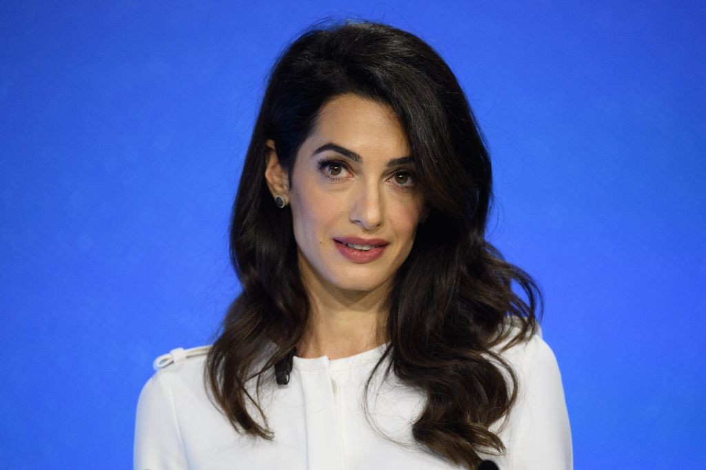 Amal Clooney in 2019 embracing a deeper,m moodier hair colour 