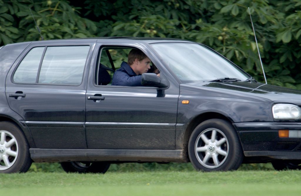 Prince William behind the wheel of his first car - a VW Golf