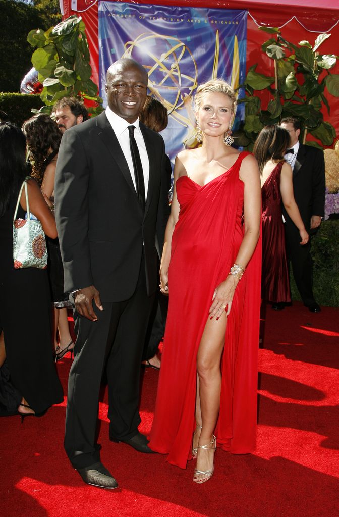 Seal and Heidi Klum smiling together on the Emmys red carpet