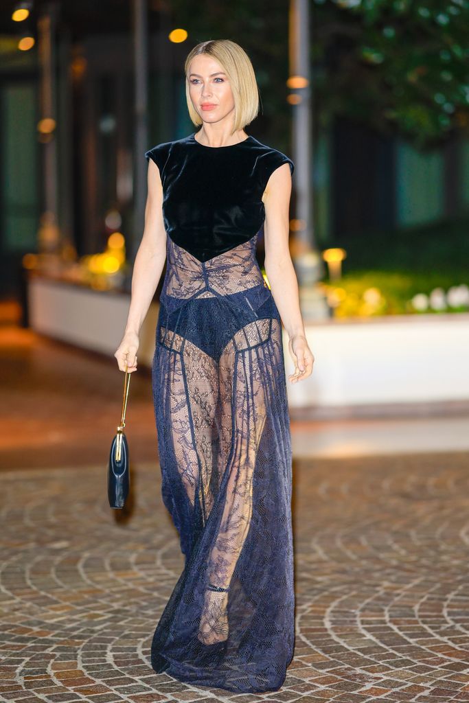 Julianne stuns in daring lace gown