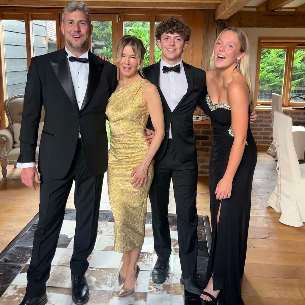 Renee poses with boyfriend Ant and his two children