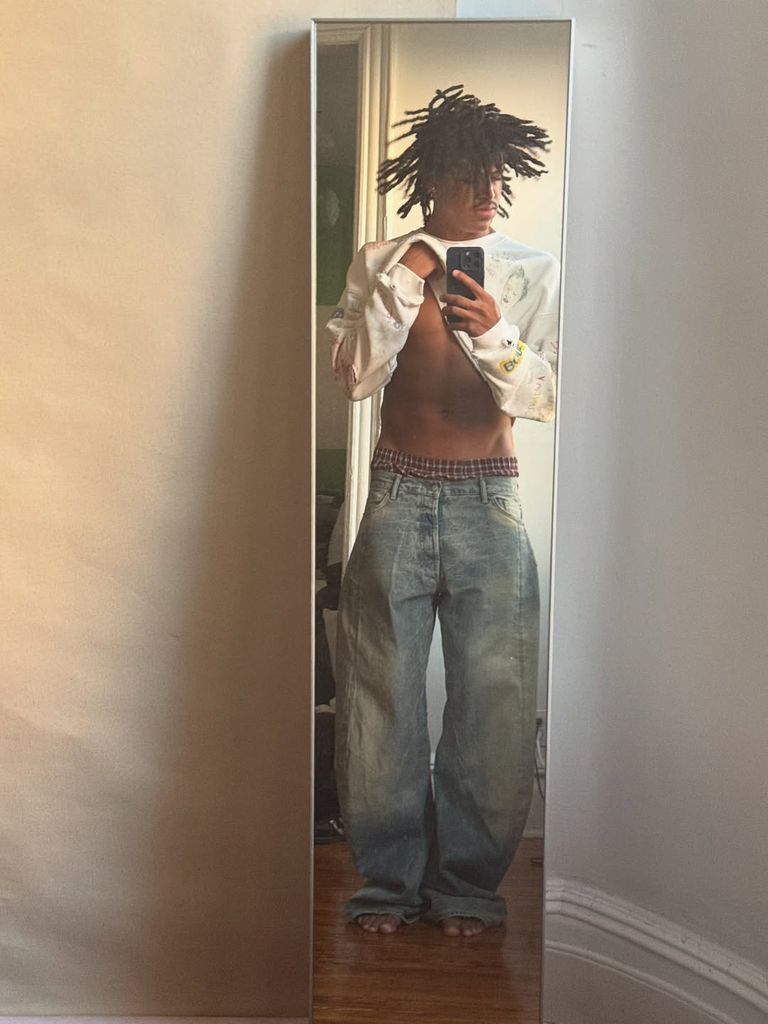 Henry Samuel posing in mirror selfie