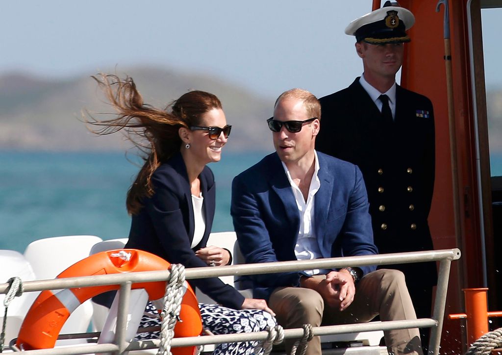 kate and william riding on boat 