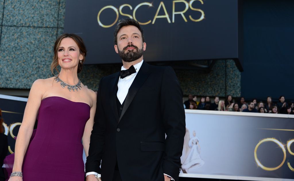 Actor/director Ben Affleck and wife actress Jennifer Garner arrive on the red carpet for the 85th Annual Academy Awards on February 24, 2013 in Hollywood, California. AFP PHOTO/FREDERIC J. BROWN        (Photo credit should read FREDERIC J. BROWN/AFP via Getty Images)