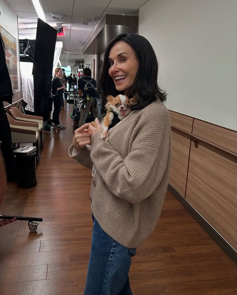 Demi Moore photographed with shorter hair on set