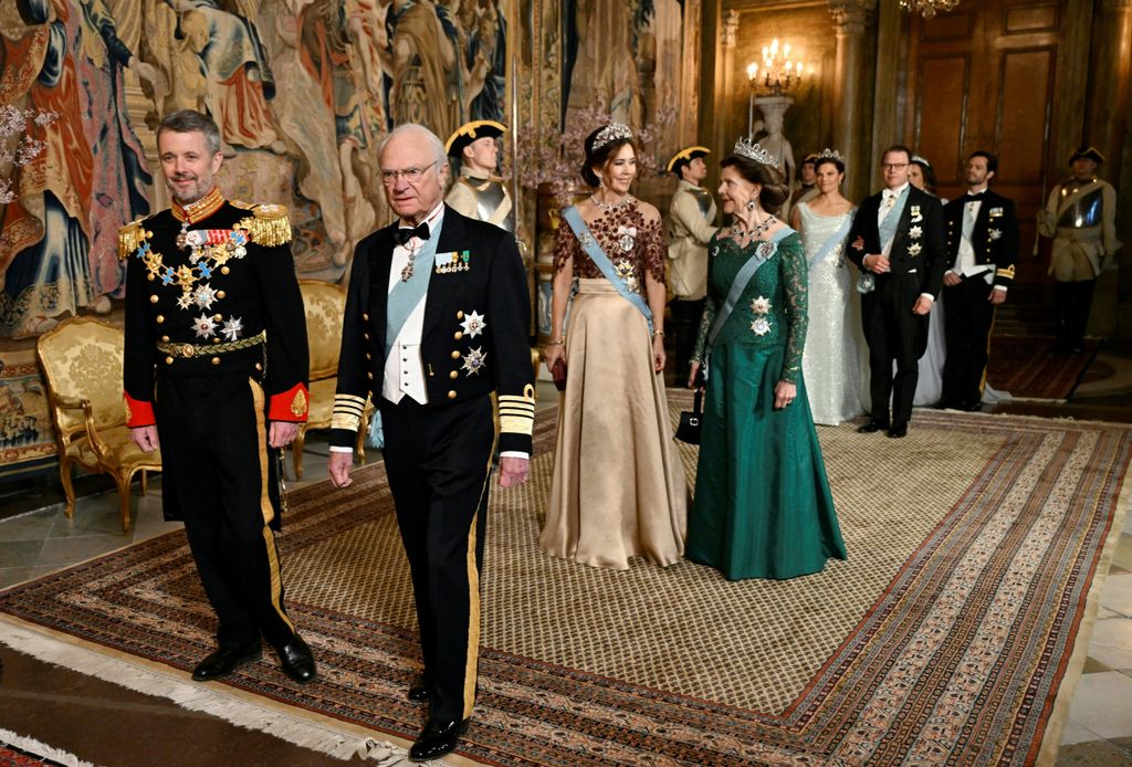 King Frederik X of Denmark and King Carl XVI Gustaf enter banquet