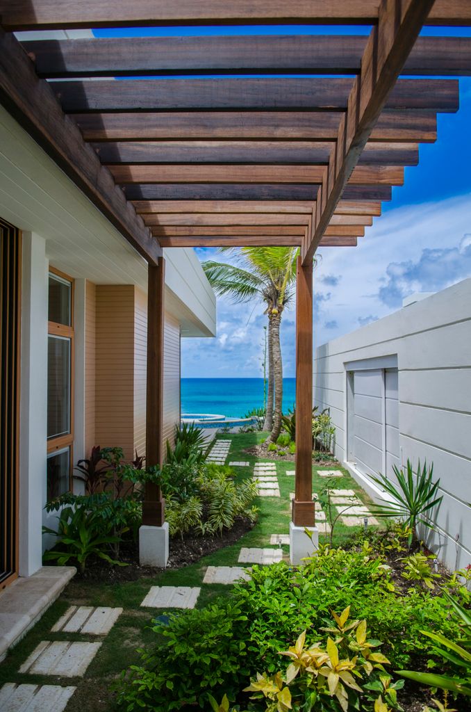 There are gardens full of life outside each villa