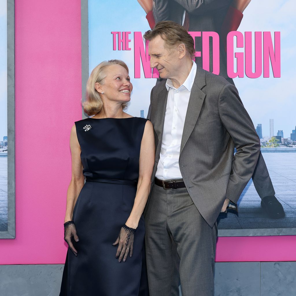 Pamela Anderson and Liam Neeson attend The Naked Gun premiere on July 28, 2025