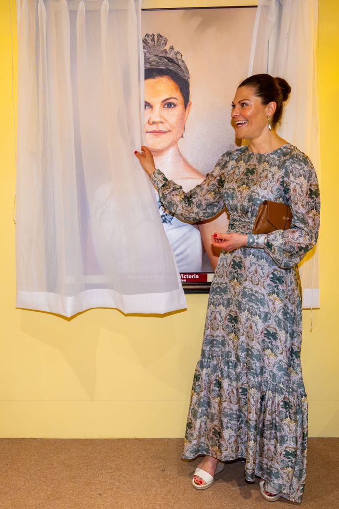 Crown Princess Victoria laughs unveiling a portrait