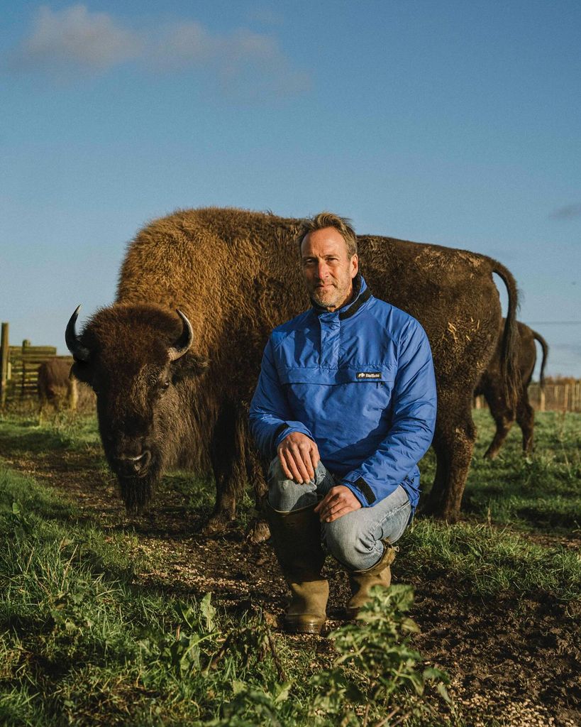 Ben Fogle posing next to a buffalo on Instagram