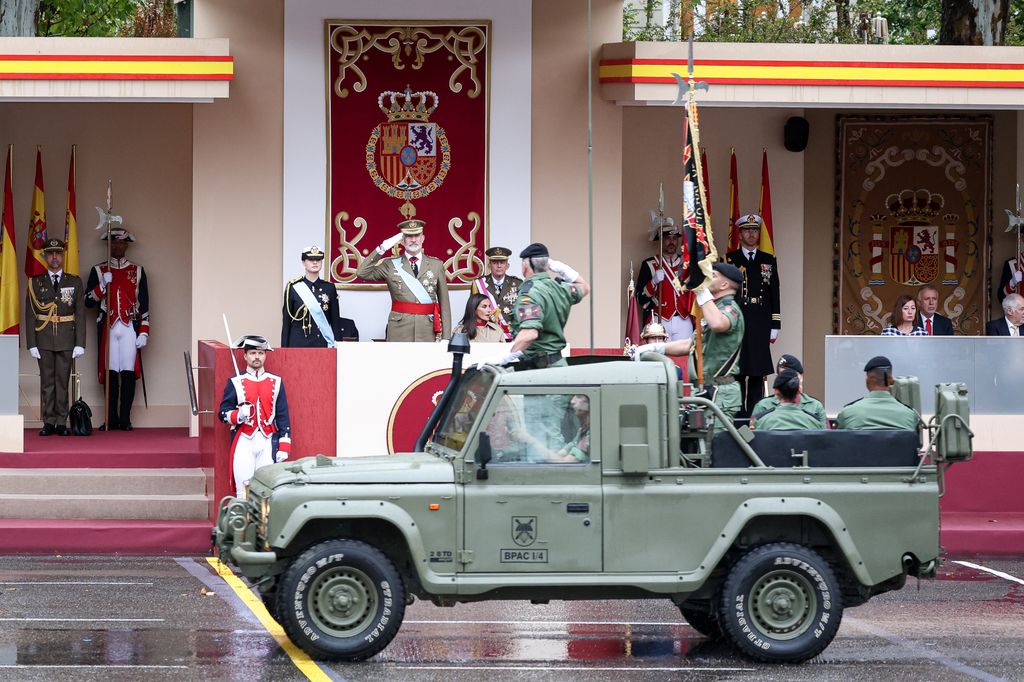 The military parade continued, in spite of the rain