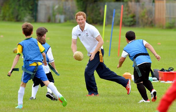 Prince Harry playing rugby