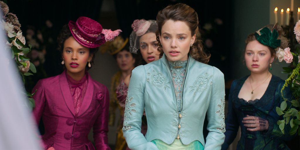 Five women stand looking shocked