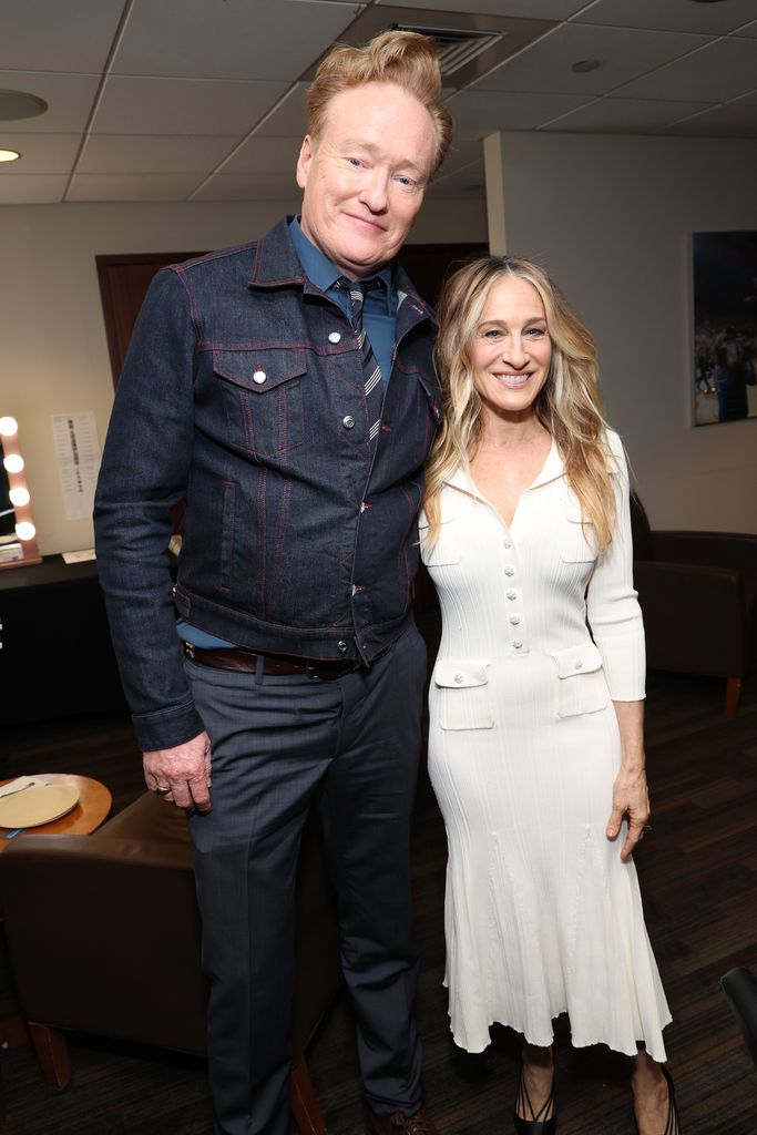 Sarah Jessica Parker in white dress with Conan O'Brien