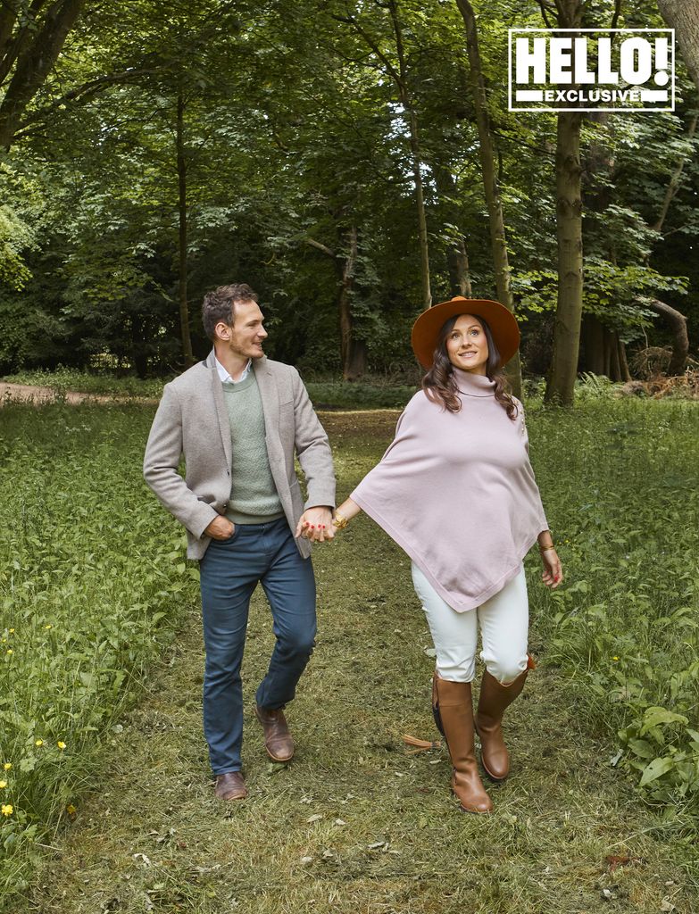 Matthew Kinloch and Johanna Squiban holding hands in the grounds at Gilmerton House