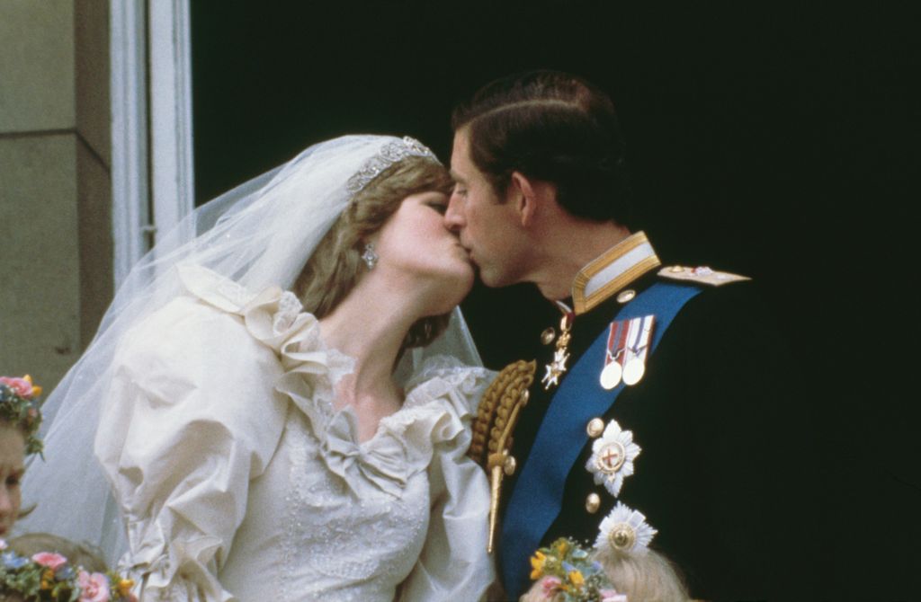 Princess Diana and King Charles kissing