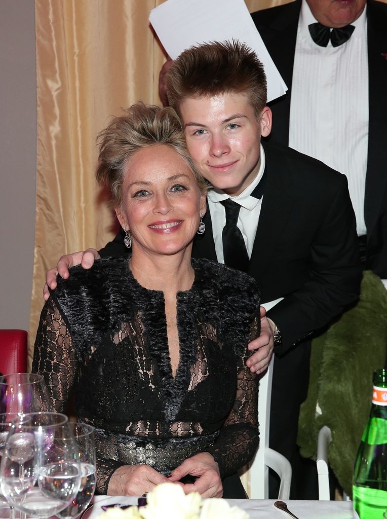 Sharon Stone and her son Roan Joseph Bronstein during the charity gala benefiting 'Planet Hope' foundation at Kempinski Grand Hotel des Bains on December 28, 2017 in St. Moritz, Switzerland