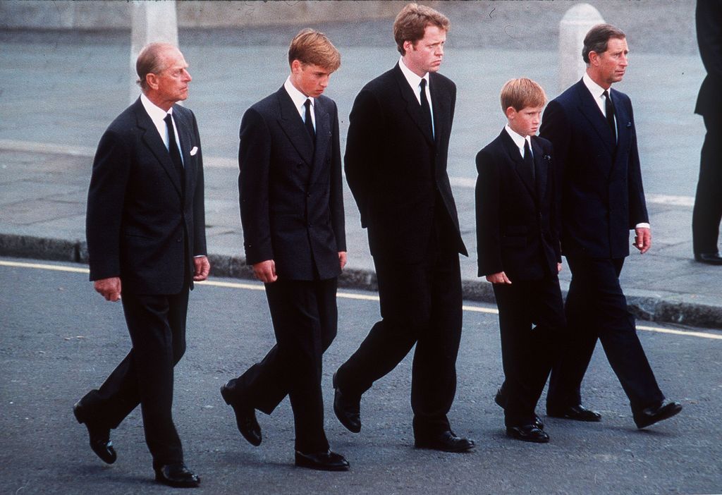 Prince Philip, Prince William, Charles Spencer, Prince Harry and King Charles following a coffin