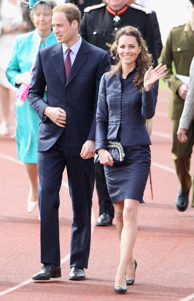 Kate beside william in blue skirt suit