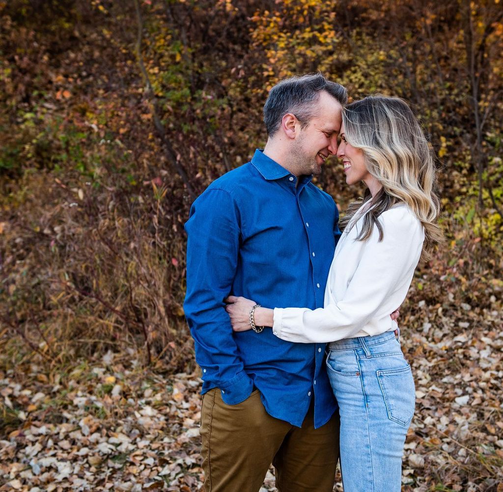 man and woman kissing in the outside