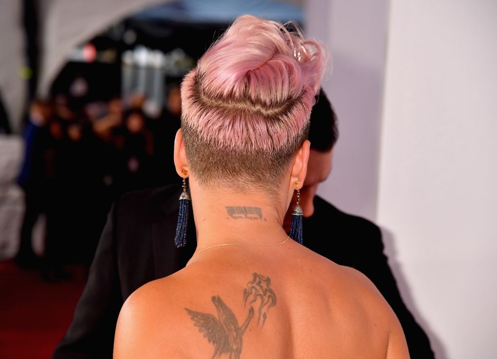 She has a large guardian angel on her arm