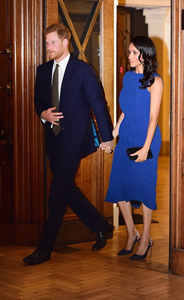 prince harry and meghan markle wearing blue dress