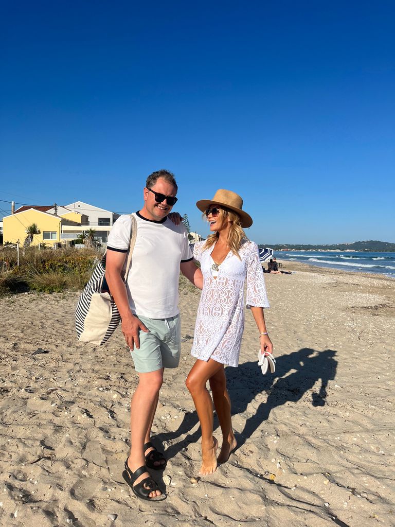 On Acharavi Beach, Amanda Holden wore a white bikini and a white beach dress by Leyla Maya