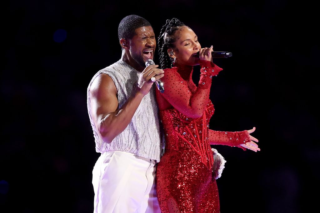 Usher and Alicia Keys perform onstage during the Apple Music Super Bowl LVIII Halftime Show at Allegiant Stadium on February 11, 2024 in Las Vegas, Nevada.