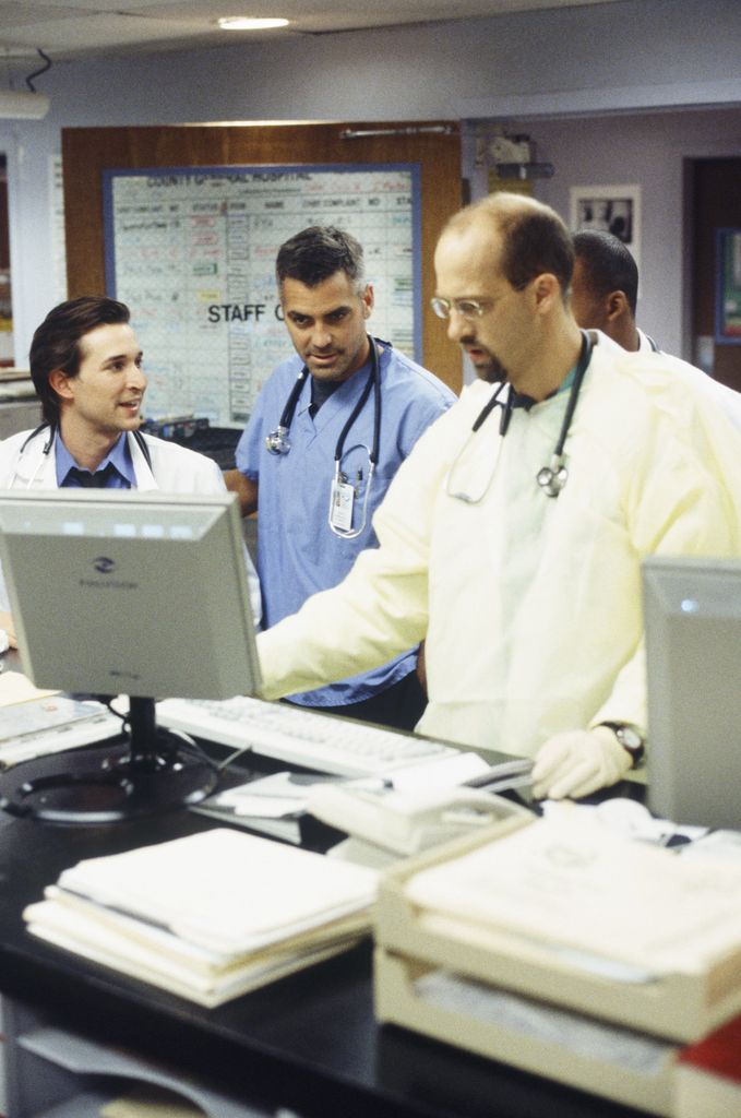 Noah Wyle as Dr. John Carter, George Clooney as Dr. Doug Ross, Anthony Edwards as Doctor Mark Greene on ER, 1999