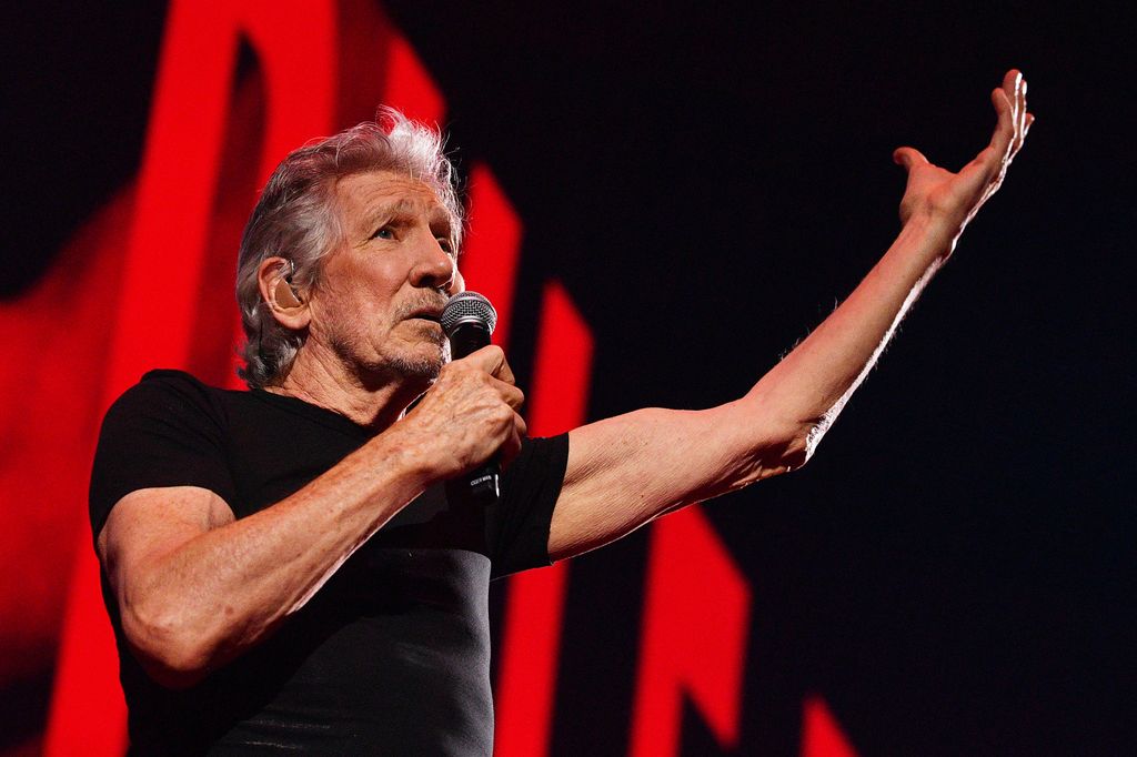 Roger Waters in black t-shirt performing on stage at The 02 Arena