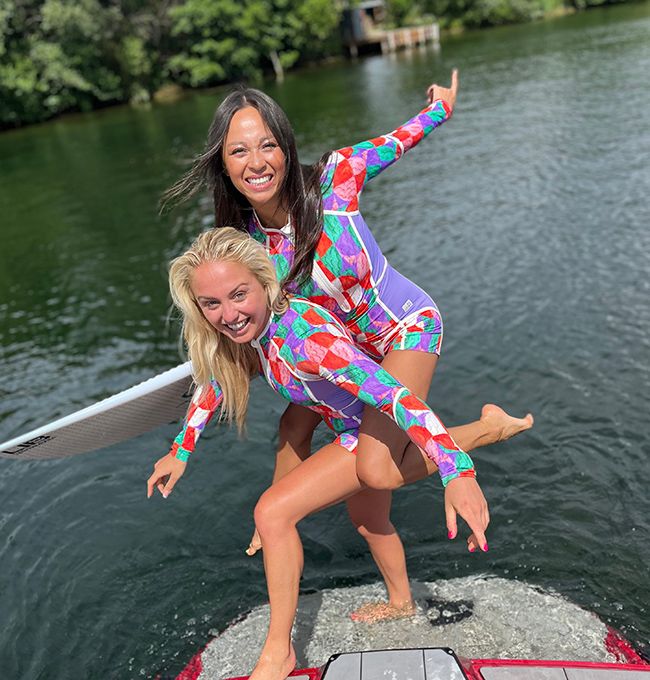 Katya Jones and Aimee Fuller smile on a boat