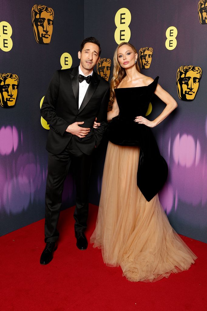 Adrien Brody and Georgina Chapman attend the EE BAFTA Film Awards 2025 at The Royal Festival Hall on February 16, 2025 in London, England.