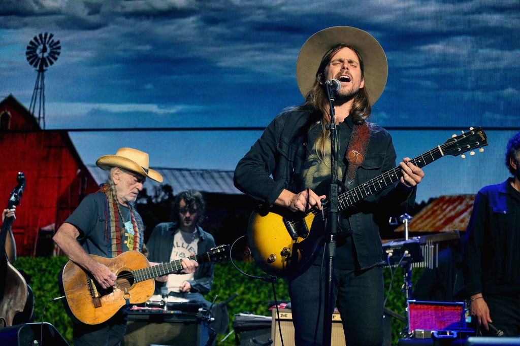 EAST TROY, WI - SEPTEMBER 21: Willie Nelson (L) and Lukas Nelson perform in concert during Farm Aid 34 at Alpine Valley Music Theatre on September 21, 2019 in East Troy, Wisconsin. (Photo by Gary Miller/Getty Images for Shock Ink)