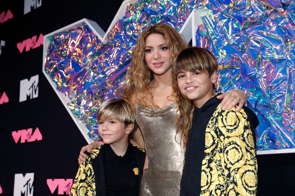 Her children Milan and Sasha were travelling with her on tour