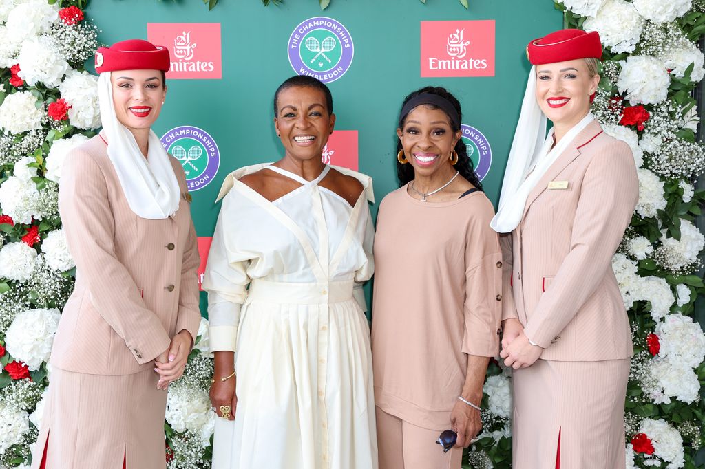 Adjoa Andoh and Gladys Knight with Emirates cabin crew