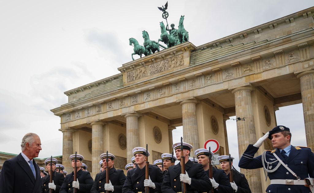 The King inspecting a guard of honour at Brandenburg Gate