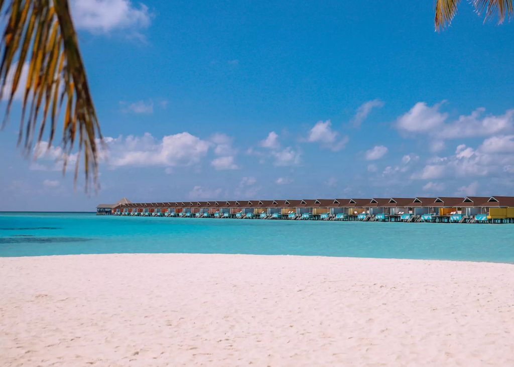 The beach and rooms at The Standard, Maldives